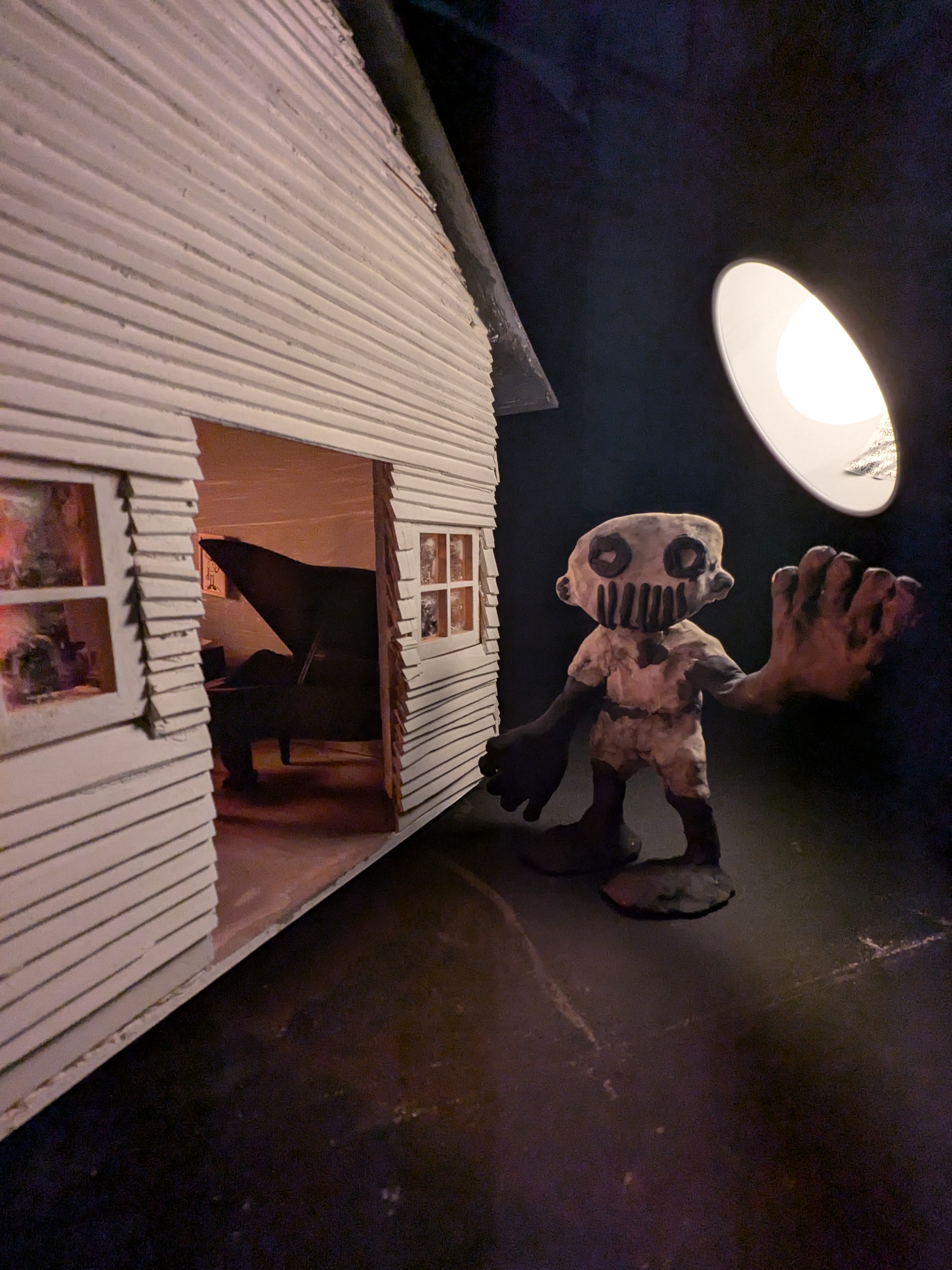 Puppet with the final version of the house